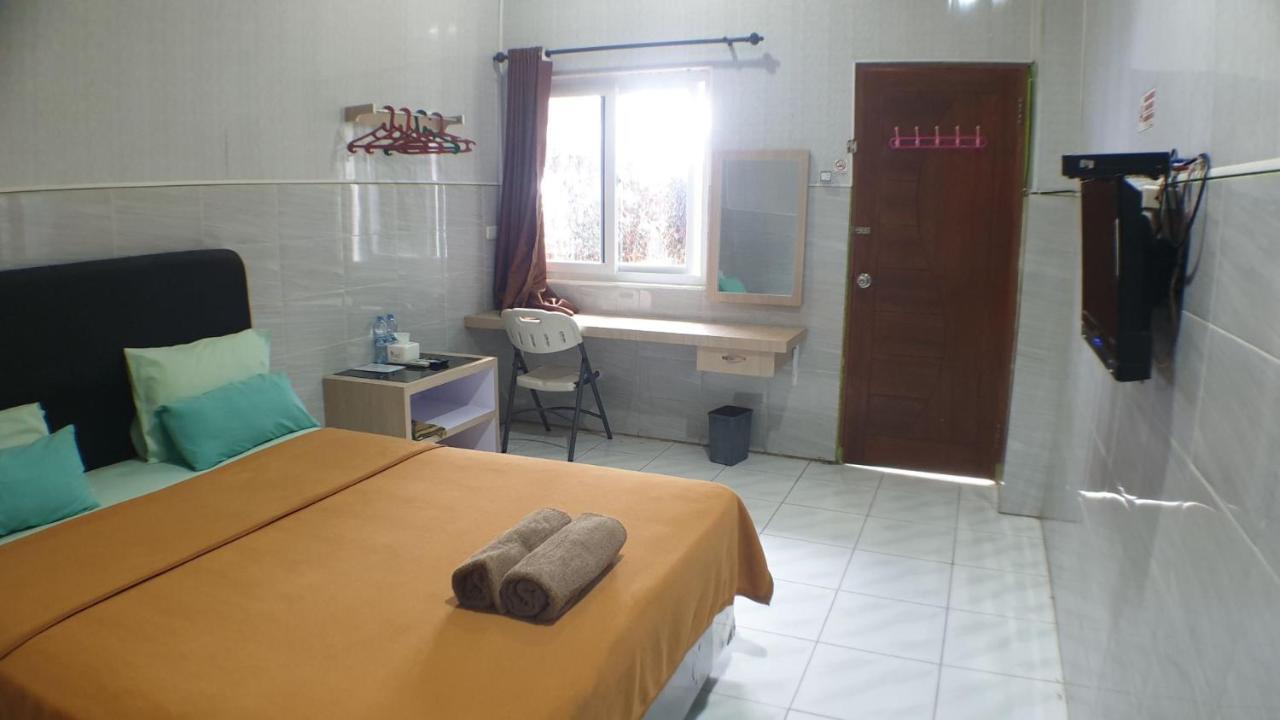 Nasional Hotel Гунунгситоли Екстериор снимка